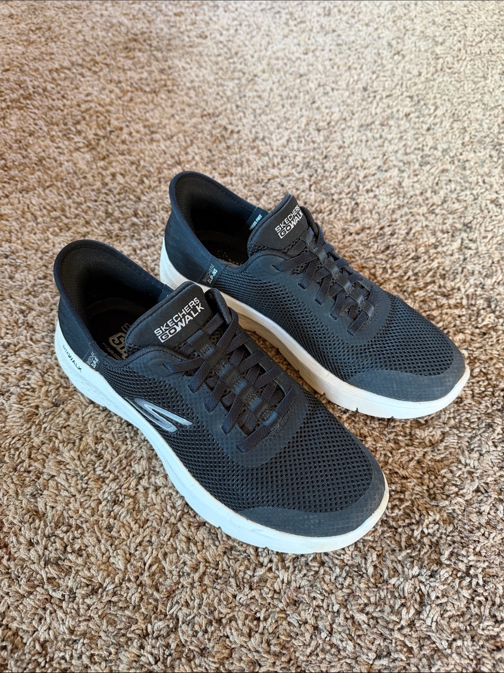 Skechers Black and White GOwalk Athletic Sneakers
